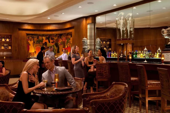 People Enjoying Drinks In The Sazerac Bar