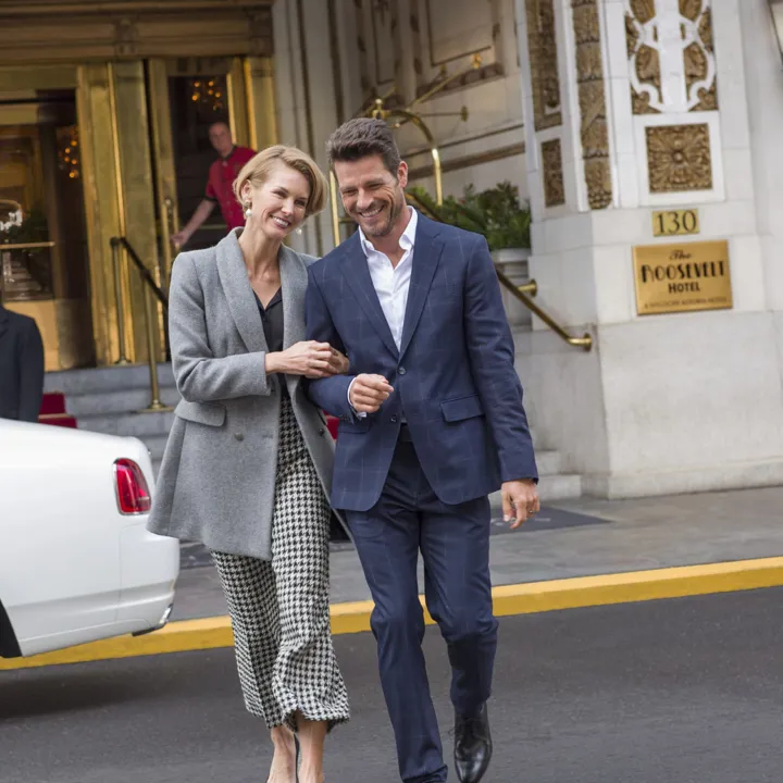Close Up Of A Couple Walking Out Of The Roosevelt
